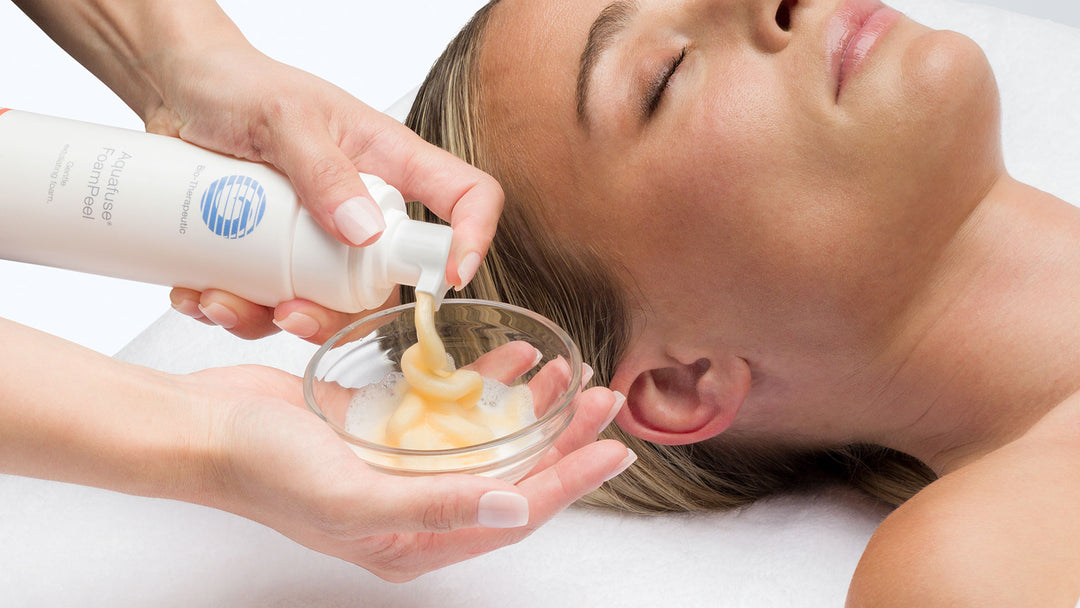 Person applying Bio-Therapeutic Aqua Foam Peel product to a bowl with a close-up of a person's face.